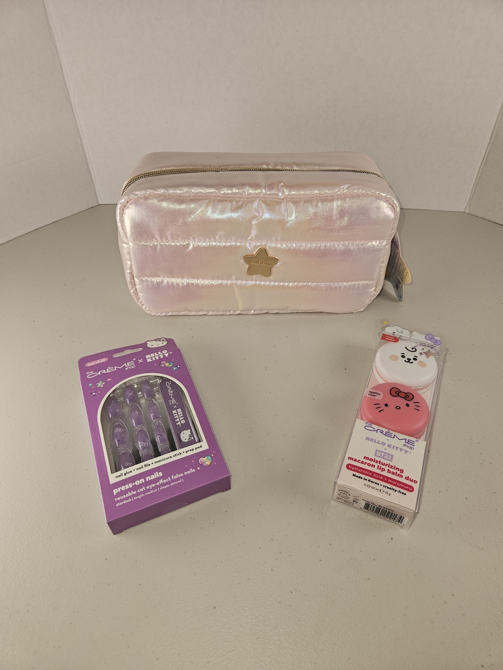 Creme Shop Shimmer Pink Quilted Cosmetic Pouch with Gold Star, Nails, & Lip Balm